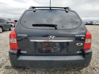 2009 Hyundai Tucson SE with VIN KM8JN72D49U975875, listed as a Copart auction lot 76923954 with 167,155 mi miles and Salvage Title. Bid and sale history available at carsss.com. Image 6.