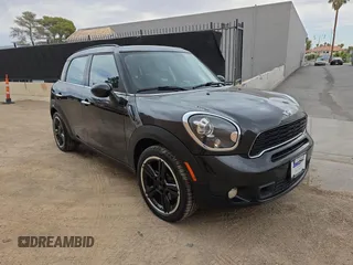 2013 MINI Countryman S with VIN WMWZC3C59DWP21859, listed as a Copart auction lot 63464255 with 100,540 mi miles and Clean title. Bid and sale history available at DreamBid. Image 1.
