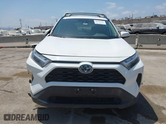 2022 Toyota RAV4 Hybrid XLE with VIN 2T3RWRFV9NW130472, listed as a IAAI auction lot 40990707 with 156,174 mi miles and . Bid and sale history available at DreamBid. Image 12.