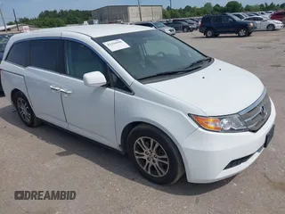 2013 Honda Odyssey EX z VIN 5FNRL5H44DB024764, wystawiony jako IAAI lot #42256598 z przebiegiem 169 708 mil mil oraz . Historia ofert i sprzedaży dostępna na DreamBid. Obrazek 1.