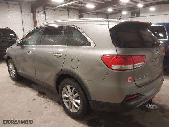 2017 Kia Sorento LX V6 with VIN 5XYPGDA55HG217691, listed as a IAAI auction lot 42083111 with 124,444 mi miles. Bid and sale history available at carsss.com. Image 3.