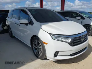2021 Honda Odyssey Touring z VIN 5FNRL6H80MB003323, wystawiony jako IAAI lot #42303968 z przebiegiem 51 531 mil mil oraz . Historia ofert i sprzedaży dostępna na DreamBid. Obrazek 1.