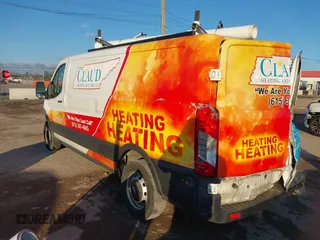 2020 Ford Transit Cargo with VIN 1FTBR1Y88LKA06393, listed as a IAAI auction lot 41283124 with 229,589 mi miles and . Bid and sale history available at DreamBid. Image 3.