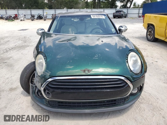 2016 MINI Clubman z VIN WMWLN5C5XG2E29275, wystawiony jako Copart lot #68162014 z przebiegiem 79 754 mil mil oraz Nie do naprawy. Historia ofert i sprzedaży dostępna na DreamBid. Obrazek 5.