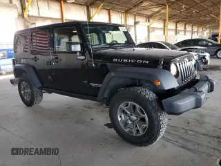 2015 Jeep Wrangler Unlimited Rubicon Hard Rock with VIN 1C4HJWFG1FL532288, listed as a Copart auction lot 62262545 with 91,807 mi miles and Salvage title. Bid and sale history available at DreamBid. Image 4.