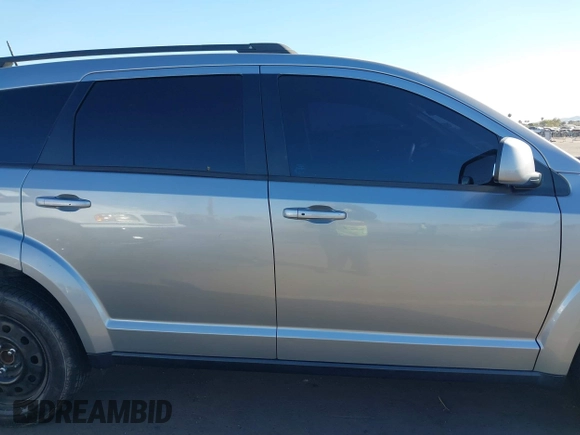 2019 Dodge Journey SE with VIN 3C4PDCBG0KT701223, listed as a IAAI auction lot 41286446 with 71,572 mi miles and . Bid and sale history available at DreamBid. Image 13.