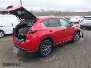 2017 Mazda CX-5 Grand Touring with VIN JM3KFBDL0H0177495, listed as a IAAI auction lot 41722655 with 58,972 mi miles. Bid and sale history available at carsss.com. Image 4.