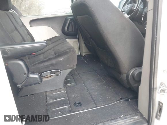 2014 Dodge Grand Caravan SE with VIN 2C4RDGBG9ER283848, listed as a IAAI auction lot 41666021 with 120,351 mi miles and . Bid and sale history available at DreamBid. Image 8.