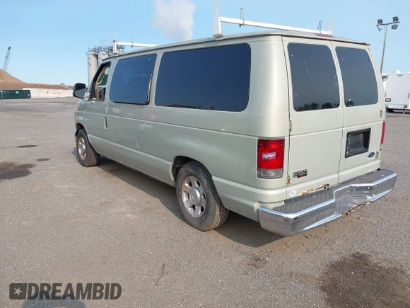 2005 Ford Econoline Passenger XL with VIN 1FMRE11W15HA64778, listed as a IAAI auction lot 42397426 with 330,632 mi miles and . Bid and sale history available at DreamBid. Image 3.