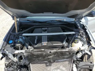 2022 BMW X4 M z VIN 5YM23EC02N9K87490, wystawiony jako Copart lot #65907114 z przebiegiem 55 555 mil mil oraz Szkoda całkowita • Salvage title. Historia ofert i sprzedaży dostępna na DreamBid. Obrazek 12.
