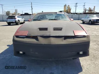 1990 Pontiac Firebird с VIN 1G2FS23T2LL206191, выставлен на аукционе Copart как лот 76175064 с пробегом 103 903 миль миль и Списание • Salvage title. История ставок и продаж доступна на DreamBid. Изображение 5.