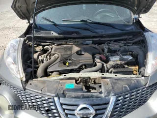 2012 Nissan Juke SL z VIN JN8AF5MVXCT122782, wystawiony jako Copart lot #50645195 z przebiegiem 156 269 mil mil oraz Szkoda całkowita • Salvage title. Historia ofert i sprzedaży dostępna na DreamBid. Obrazek 13.