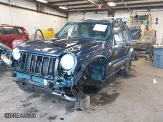2005 Jeep Liberty Sport with VIN 1J4GL48K45W581682, listed as a IAAI auction lot 41675367 with 261,982 mi miles. Bid and sale history available at carsss.com. Image 19.