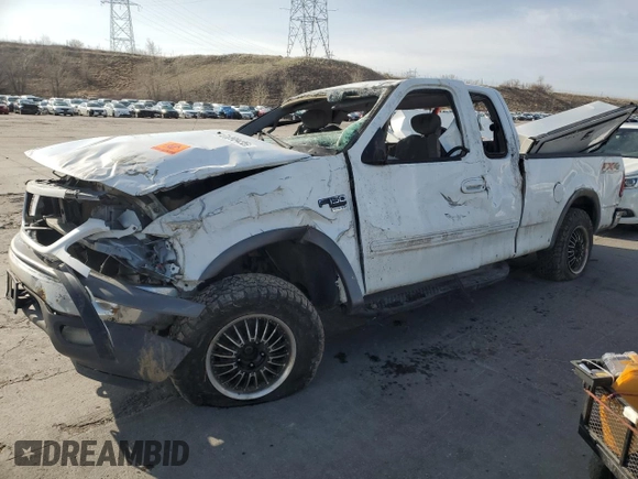 2002 Ford F-150 XL with VIN 1FTRX18L12NA01509, listed as a Copart auction lot 51098435 with Not provided miles and Salvage title. Bid and sale history available at DreamBid. Image 1.