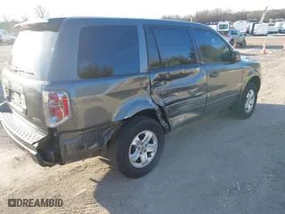 2007 Honda Pilot LX with VIN 2HKYF18197H504905, listed as a IAAI auction lot 41293667 with 200,448 mi miles. Bid and sale history available at carsss.com. Image 4.