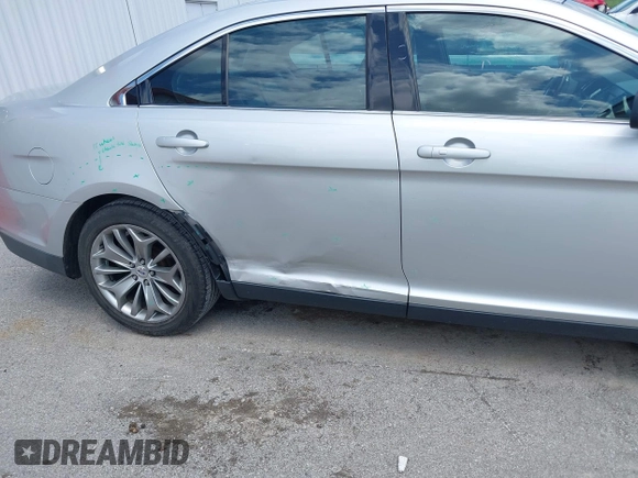 2013 Ford Taurus Limited with VIN 1FAHP2F8XDG117448, listed as a IAAI auction lot 39585596 with 150,747 mi miles and . Bid and sale history available at DreamBid. Image 6.