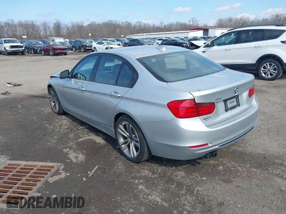 2014 BMW 3 Series 328i xDrive with VIN WBA3B3C58EJ980379, listed as a IAAI auction lot 41678676 with 183,278 mi miles. Bid and sale history available at carsss.com. Image 3.