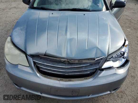 2008 Chrysler Sebring LX с VIN 1C3LC45KX8N131669, выставлен на аукционе Copart как лот 50821995 с пробегом 151 053 миль миль и Списание • Salvage title. История ставок и продаж доступна на DreamBid. Изображение 12.