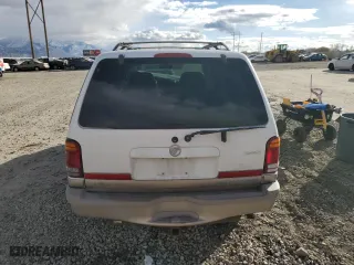 2000 Mercury Mountaineer with VIN 4M2DU66P8YUJ15148, listed as a Copart auction lot 84107204 with 194,511 mi miles and Salvage Title. Bid and sale history available at carsss.com. Image 6.
