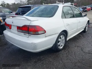 2002 Honda Accord Sdn EX with VIN JHMCG56632C004934, listed as a IAAI auction lot 41595113 with 298,868 mi miles. Bid and sale history available at carsss.com. Image 4.