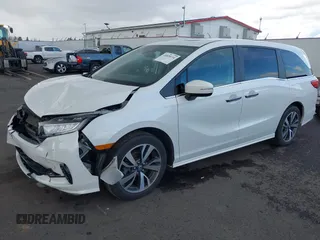2022 Honda Odyssey Touring with VIN 5FNRL6H8XNB057293, listed as a IAAI auction lot 41826014 with 30,454 mi miles and . Bid and sale history available at DreamBid. Image 17.