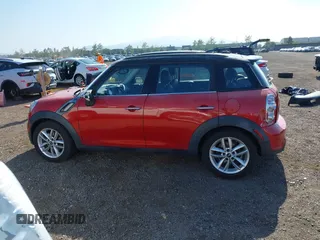 2013 MINI Countryman S z VIN WMWZC3C52DWP23887, wystawiony jako IAAI lot #42278143 z przebiegiem 63 625 mil mil oraz . Historia ofert i sprzedaży dostępna na DreamBid. Obrazek 14.