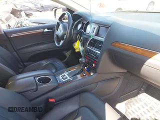 2014 Audi Q7 Premium Plus with VIN WA1LGAFE5ED014701, listed as a IAAI auction lot 42107552 with 98,919 mi miles and . Bid and sale history available at DreamBid. Image 5.