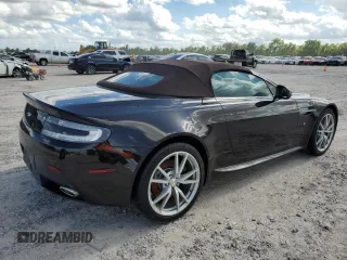 2013 Aston Martin Vantage z VIN SCFEKBBK1DGD17118, wystawiony jako Copart lot #60636224 z przebiegiem 50 591 mil mil oraz Szkody całkowita. Historia ofert i sprzedaży dostępna na DreamBid. Obrazek 3.