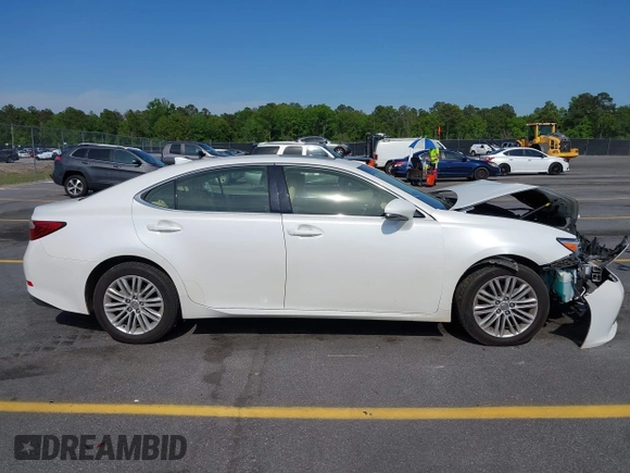 2015 Lexus ES 330 with VIN JTHBK1GG2F2203074, listed as a IAAI auction lot 42056683 with 90,407 mi miles and . Bid and sale history available at DreamBid. Image 13.