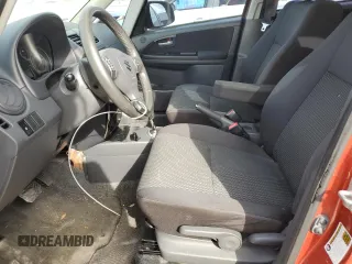 2013 Suzuki SX4 with VIN JS2YB5A42D6100038, listed as a Copart auction lot 73148344 with 141,675 mi miles and Salvage Title. Bid and sale history available at DreamBid. Image 7.