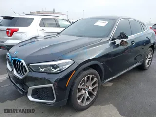 2021 BMW X6 xDrive40i with VIN 5UXCY6C08M9G88854, listed as a IAAI auction lot 41733568 with 30,150 mi miles. Bid and sale history available at carsss.com. Image 6.