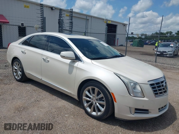 2013 Cadillac XTS Luxury with VIN 2G61P5S34D9138319, listed as a IAAI auction lot 42626756 with 88,743 mi miles and . Bid and sale history available at DreamBid. Image 1.