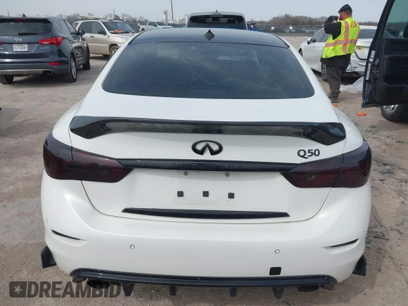 2015 Infiniti Q50 z VIN JN1BV7APXFM335981, wystawiony jako IAAI lot #41718555 z przebiegiem 83 918 mil mil oraz . Historia ofert i sprzedaży dostępna na DreamBid. Obrazek 15.