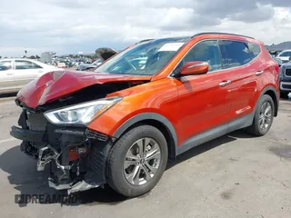 2014 Hyundai Santa Fe z VIN 5XYZUDLB4EG138898, wystawiony jako IAAI lot #42196491 z przebiegiem Nie podano mil oraz . Historia ofert i sprzedaży dostępna na DreamBid. Obrazek 17.