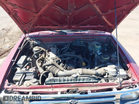 1992 Toyota Pickup DLX z VIN 4TARN81PXNZ030799, wystawiony jako IAAI lot #41879500 z przebiegiem 221 198 mil mil oraz . Historia ofert i sprzedaży dostępna na DreamBid. Obrazek 10.