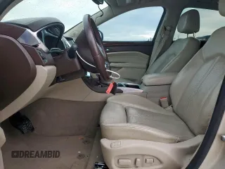 2013 Cadillac SRX Luxury Collection z VIN 3GYFNCE31DS568086, wystawiony jako Copart lot #55923155 z przebiegiem 147 148 mil mil oraz Szkoda całkowita • Salvage title. Historia ofert i sprzedaży dostępna na DreamBid. Obrazek 7.