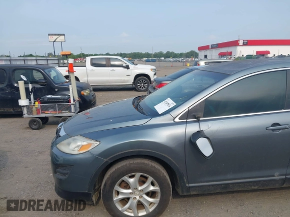 2011 Mazda CX-9 Touring with VIN JM3TB2CA4B0322612, listed as a IAAI auction lot 42387836 with 180,438 mi miles and . Bid and sale history available at DreamBid. Image 16.