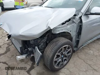 2023 BMW X1 xDrive28i with VIN WBX73EF02P5Y08733, listed as a IAAI auction lot 41901171 with 13,684 mi miles and . Bid and sale history available at DreamBid. Image 19.