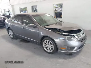 2012 Ford Fusion SEL z VIN 3FAHP0JAXCR348033, wystawiony jako IAAI lot #42342226 z przebiegiem 171 216 mil mil oraz . Historia ofert i sprzedaży dostępna na DreamBid. Obrazek 1.