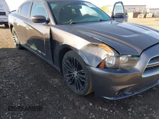 2013 Dodge Charger SXT with VIN 2C3CDXHG3DH593614, listed as a IAAI auction lot 42138282 with 174,243 mi miles. Bid and sale history available at carsss.com. Image 6.