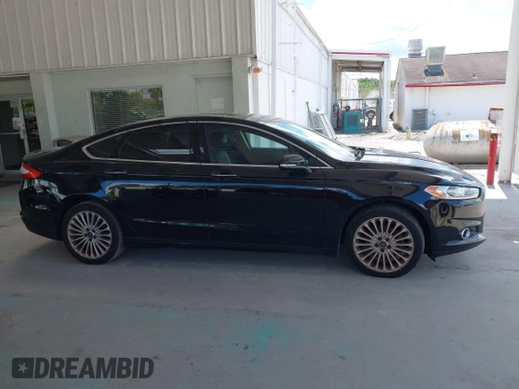 2016 Ford Fusion Titanium with VIN 3FA6P0K99GR235692, listed as a IAAI auction lot 42587743 with 169,467 mi miles and . Bid and sale history available at DreamBid. Image 13.