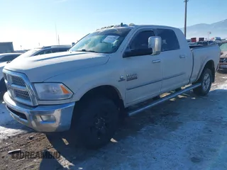 2016 Ram 2500 Laramie with VIN 3C6UR5NLXGG205295, listed as a IAAI auction lot 41445788 with 161,199 mi miles and . Bid and sale history available at DreamBid. Image 2.