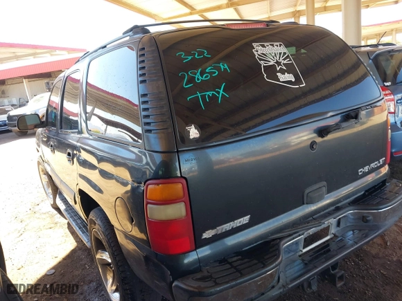 2003 Chevrolet Tahoe LT with VIN 1GNEC13Z03R286579, listed as a IAAI auction lot 41872493 with 236,001 mi miles. Bid and sale history available at carsss.com. Image 3.