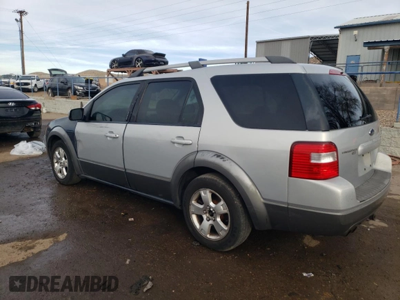 2005 Ford Freestyle SEL z VIN 1FMDK05165GA15433, wystawiony jako Copart lot #87221574 z przebiegiem Nie podano mil oraz Szkoda całkowita • Salvage title. Historia ofert i sprzedaży dostępna na DreamBid. Obrazek 2.