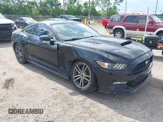 2015 Ford Mustang EcoBoost z VIN 1FA6P8TH6F5319636, wystawiony jako IAAI lot #42667885 z przebiegiem 186 427 mil mil oraz . Historia ofert i sprzedaży dostępna na DreamBid. Obrazek 1.