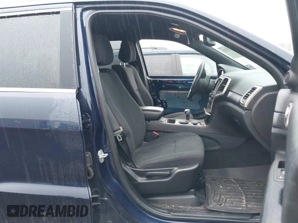 2014 Jeep Grand Cherokee Laredo with VIN 1C4RJFAGXEC109865, listed as a IAAI auction lot 41971070 with 129,460 mi miles. Bid and sale history available at carsss.com. Image 5.