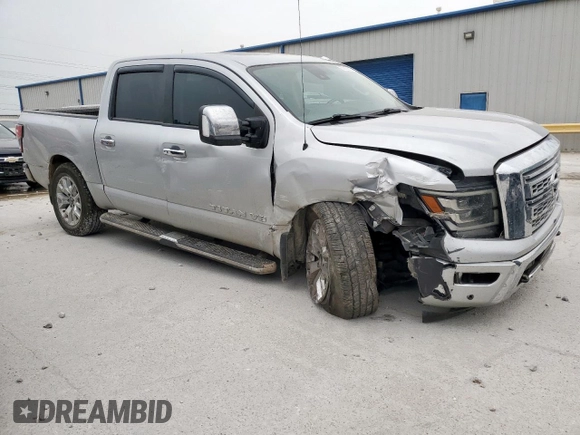 2020 Nissan Titan SL с VIN 1N6AA1ED5LN501764, выставлен на аукционе Copart как лот 53825815 с пробегом 161 163 миль миль и Списание • Salvage title. История ставок и продаж доступна на DreamBid. Изображение 4.