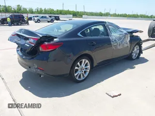 2015 Mazda 6 i Touring with VIN JM1GJ1V67F1174536, listed as a IAAI auction lot 41823441 with 100,264 mi miles. Bid and sale history available at carsss.com. Image 4.