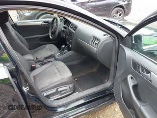2017 Volkswagen Jetta S z VIN 3VW2B7AJ3HM303198, wystawiony jako IAAI lot #42651056 z przebiegiem 126 253 mil mil oraz . Historia ofert i sprzedaży dostępna na DreamBid. Obrazek 5.