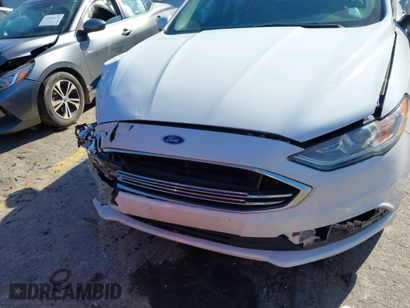 2018 Ford Fusion S with VIN 3FA6P0G76JR270334, listed as a IAAI auction lot 41490738 with 98,920 mi miles. Bid and sale history available at carsss.com. Image 6.